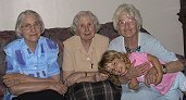 The last time we were all together in England - and Stephi just had to jump on to Great Aunty Maud's lap! (25th Augut 2002)