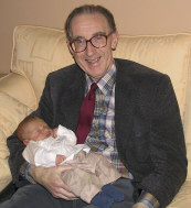 My husband, John, with baby Andrew sleeping on his lap.  Andrew was 16 days old in this photograph